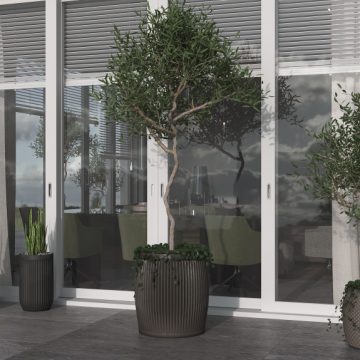 Concrete flower pots. Terrace arrangement in modern style